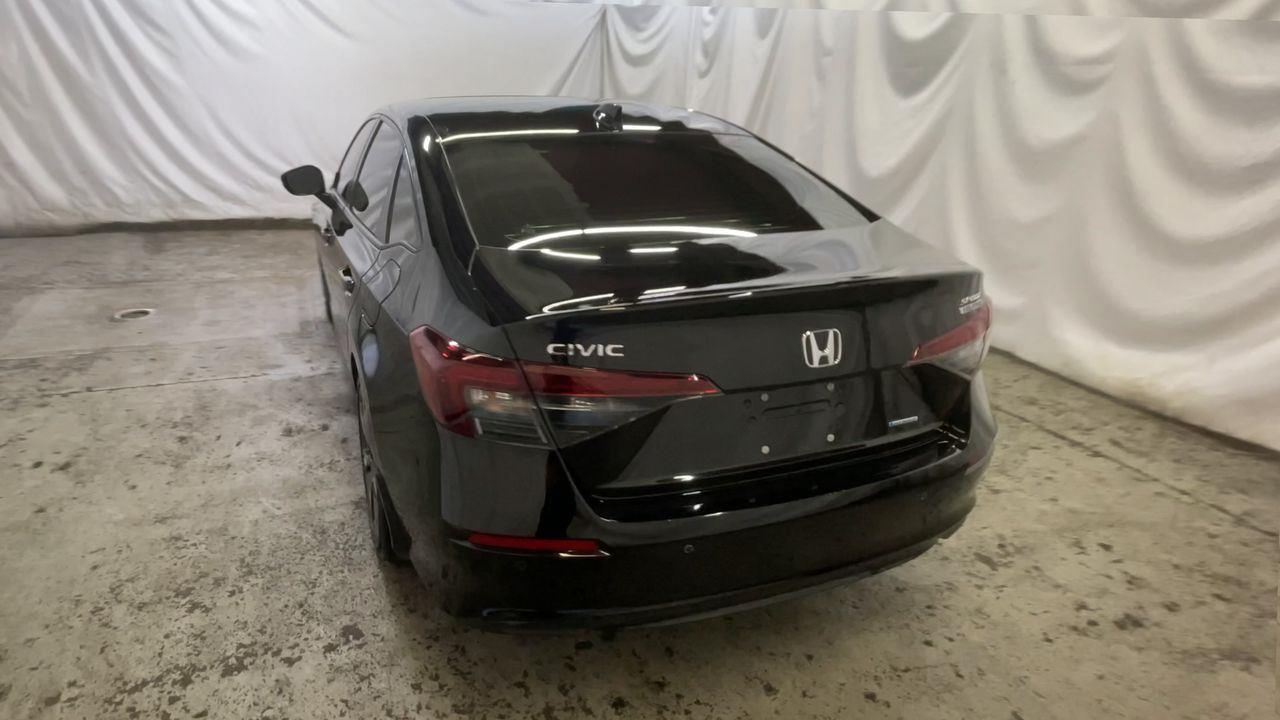 2025 Honda Civic Sedan Hybrid Sport Touring - Crystal Black Pearl exterior view 7