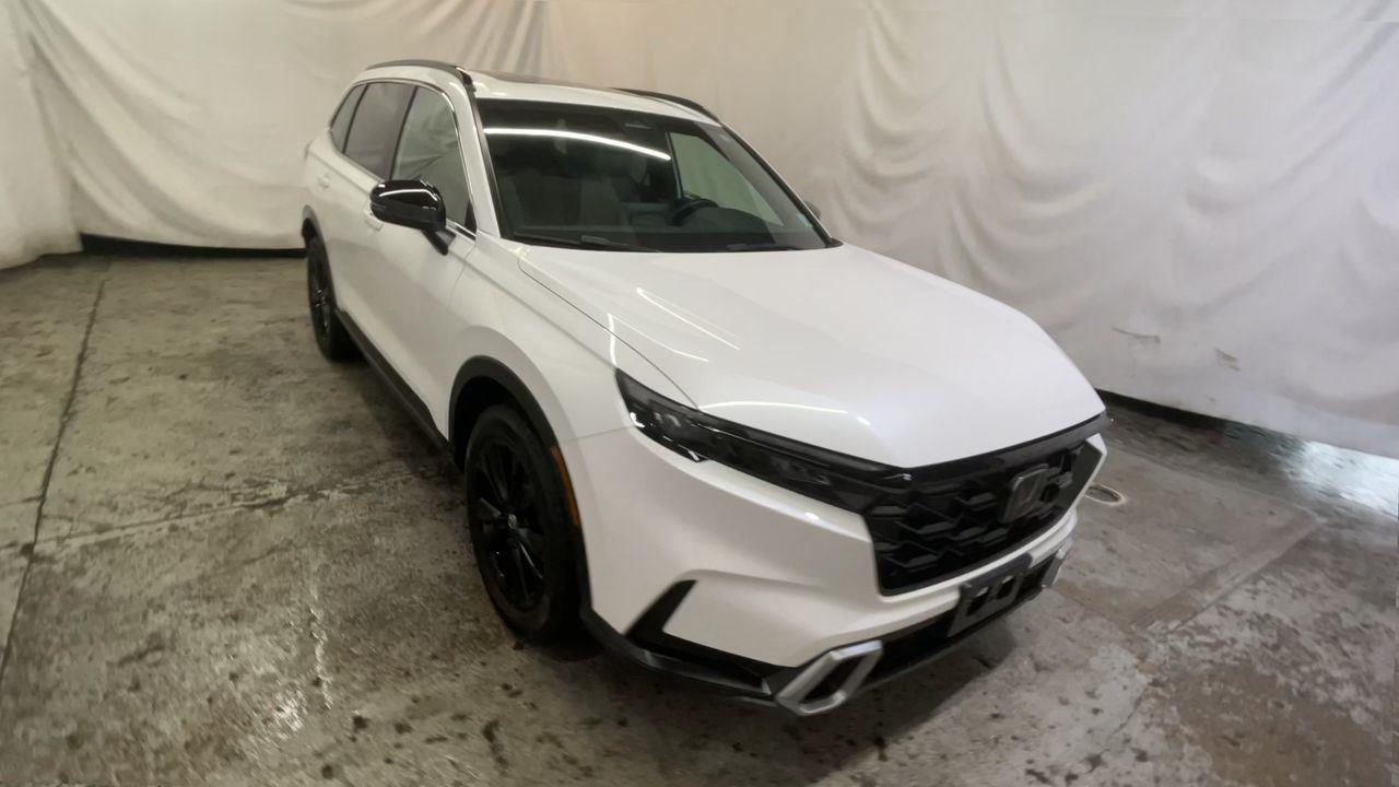 2024 Honda CR-V Hybrid Sport Touring - Platinum White Pearl exterior view 2