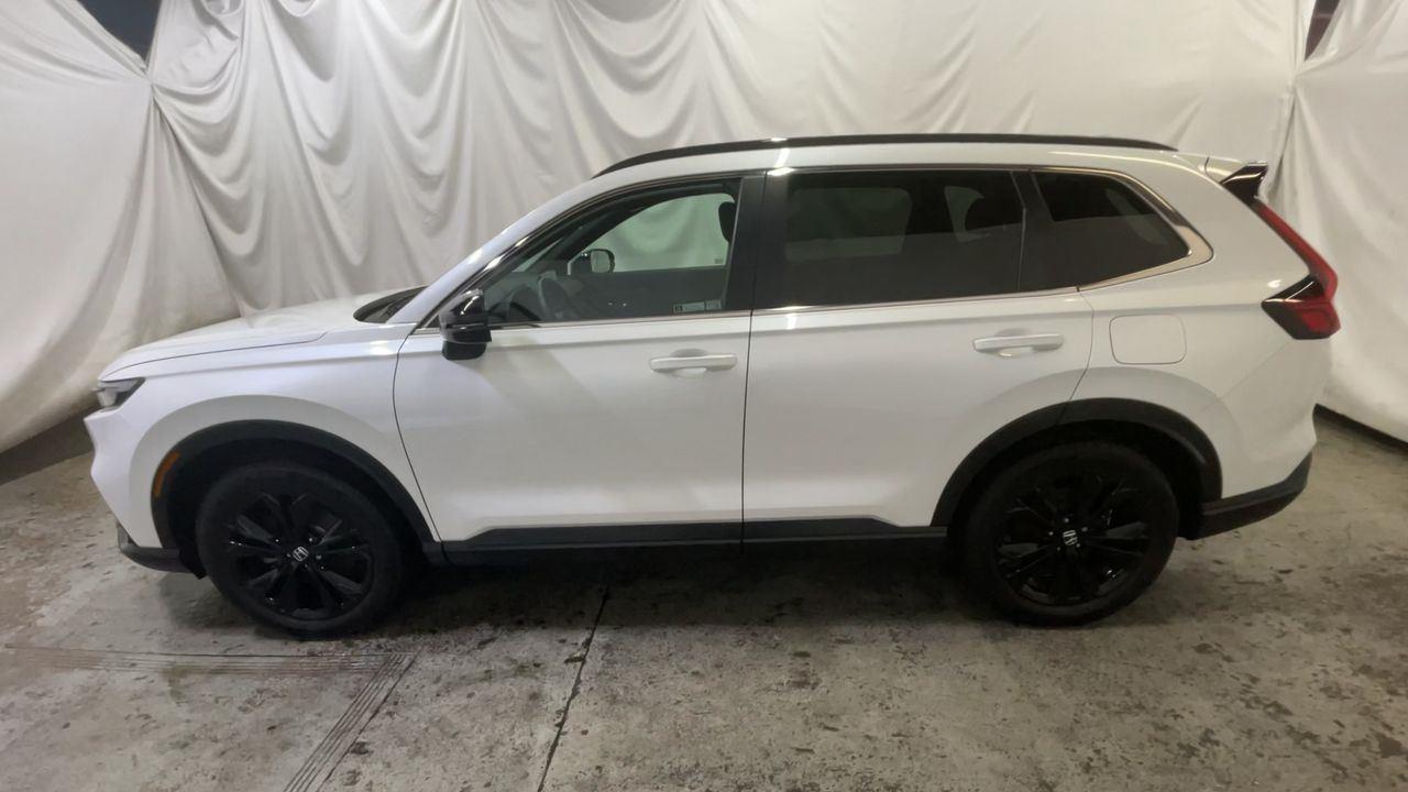 2024 Honda CR-V Hybrid Sport Touring - Platinum White Pearl exterior view 5