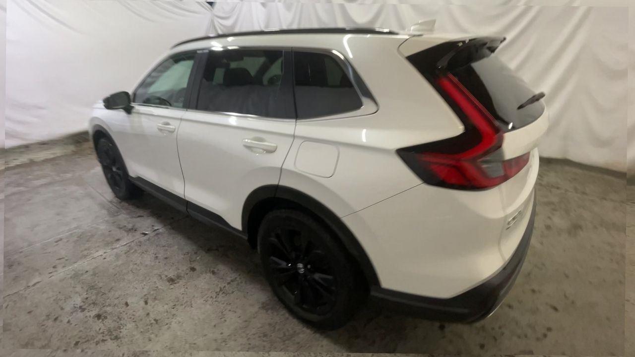 2024 Honda CR-V Hybrid Sport Touring - Platinum White Pearl exterior view 6