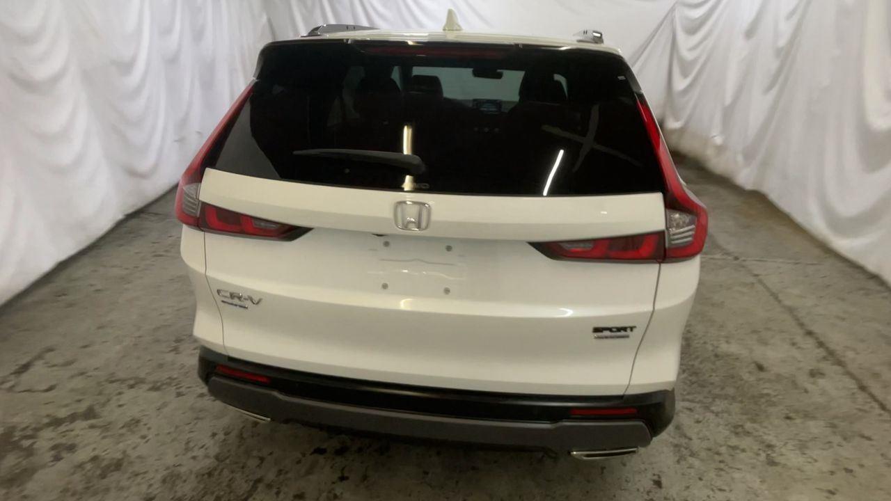 2024 Honda CR-V Hybrid Sport Touring - Platinum White Pearl exterior view 7