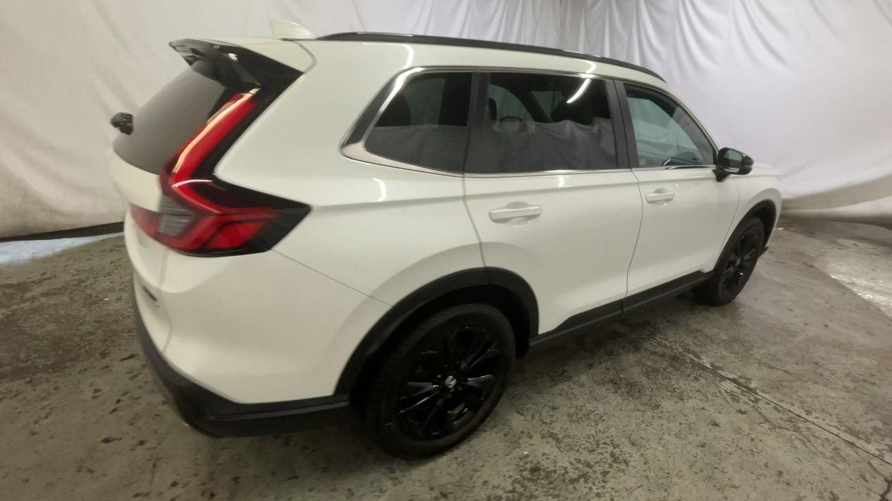 2024 Honda CR-V Hybrid Sport Touring - Platinum White Pearl exterior view 8