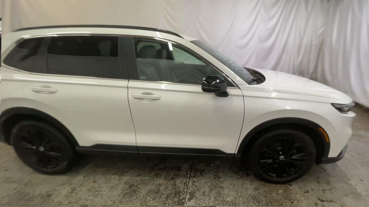 2024 Honda CR-V Hybrid Sport Touring - Platinum White Pearl exterior view 9