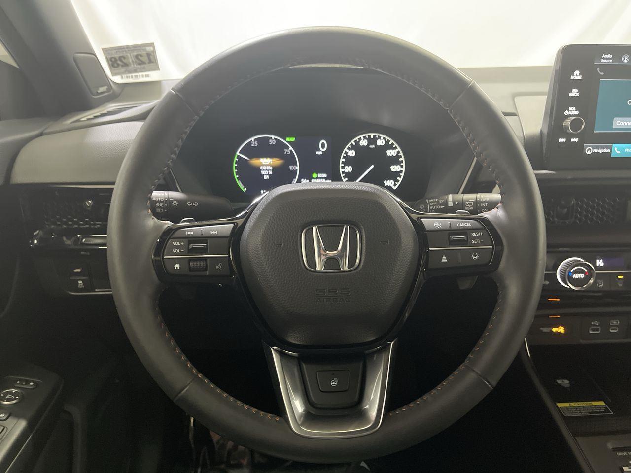 2024 Honda CR-V Hybrid Sport Touring - Platinum White Pearl exterior view 14