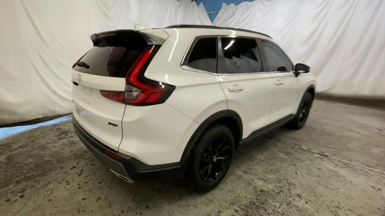 2024 Honda CR-V Hybrid Sport-L - Platinum White Pearl exterior view 8