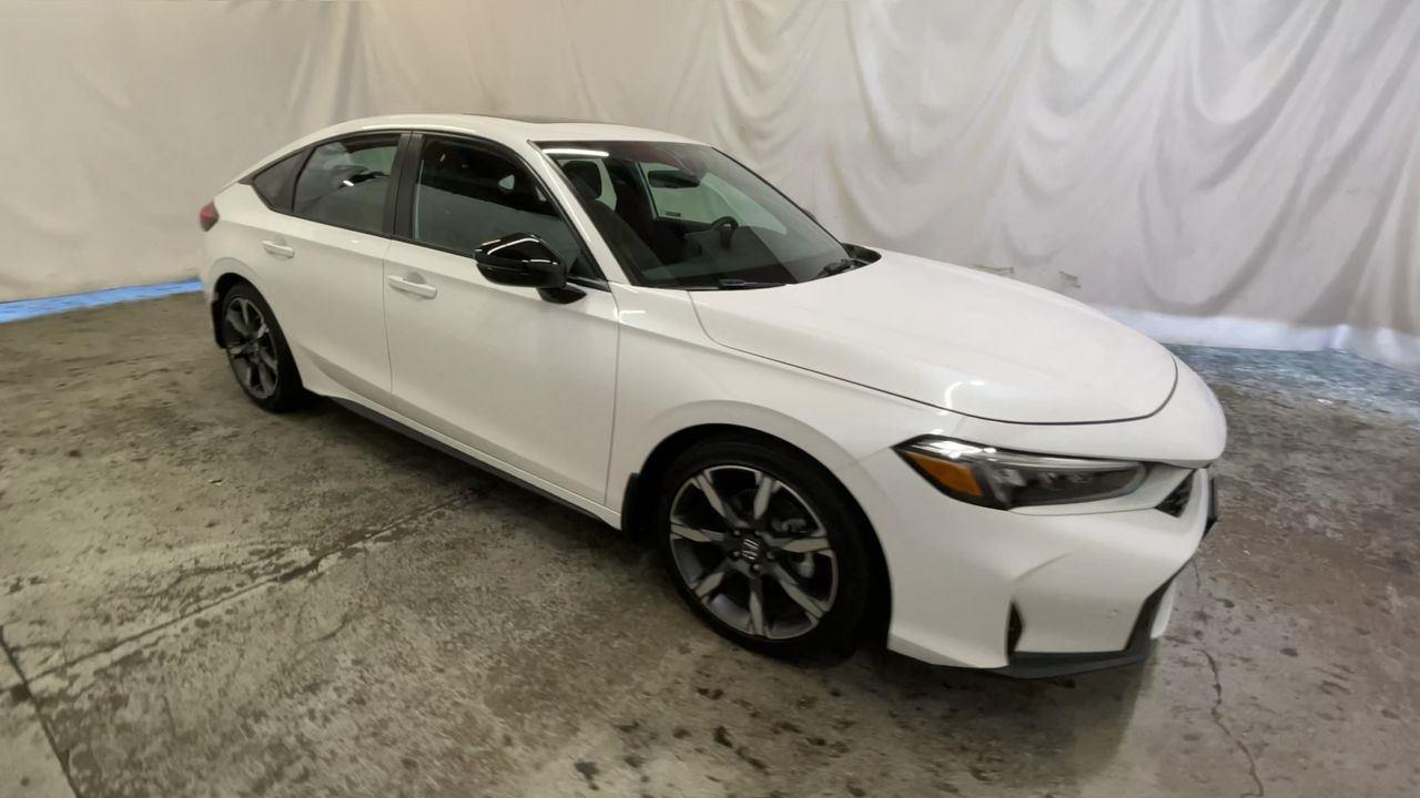 2025 Honda Civic Hatchback Hybrid Sport Touring - Platinum White Pearl exterior view 2
