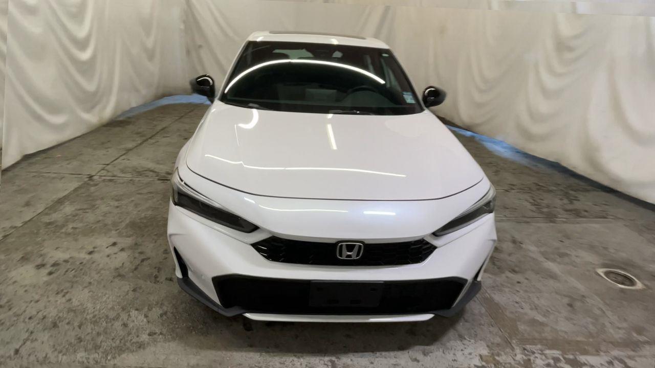 2025 Honda Civic Hatchback Hybrid Sport Touring - Platinum White Pearl exterior view 3