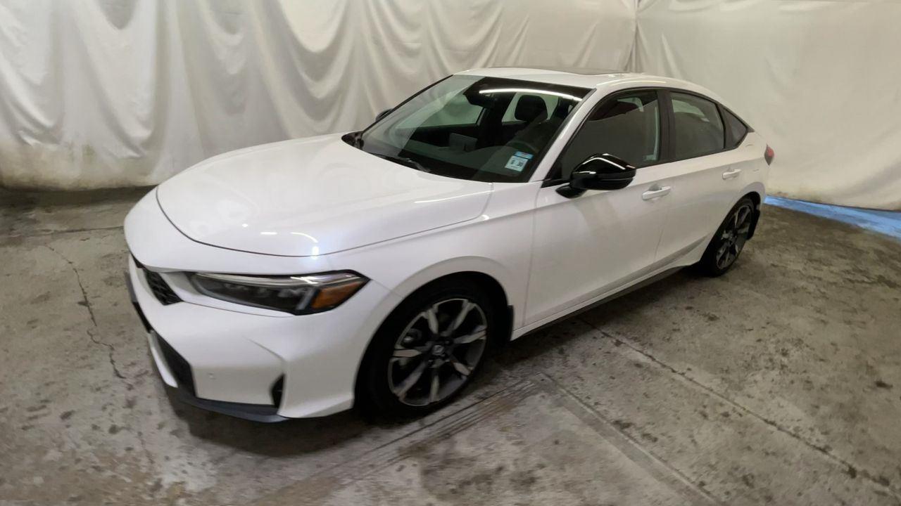 2025 Honda Civic Hatchback Hybrid Sport Touring - Platinum White Pearl exterior view 4