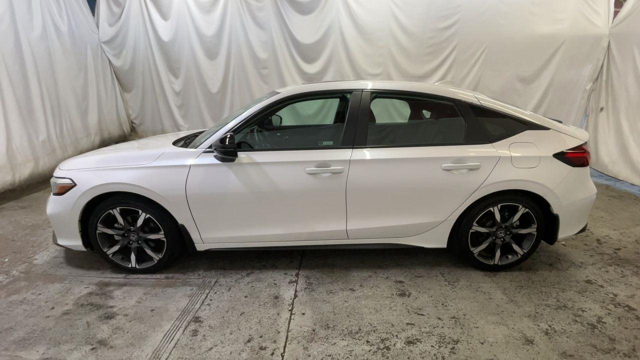 2025 Honda Civic Hatchback Hybrid Sport Touring - Platinum White Pearl exterior view 5