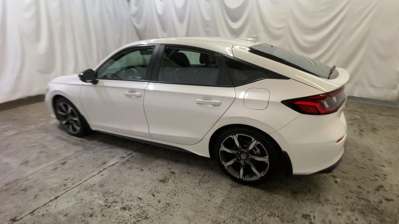 2025 Honda Civic Hatchback Hybrid Sport Touring - Platinum White Pearl exterior view 6
