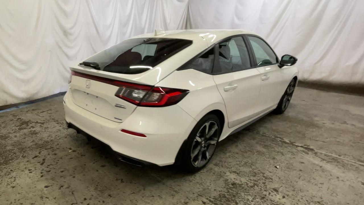 2025 Honda Civic Hatchback Hybrid Sport Touring - Platinum White Pearl exterior view 8