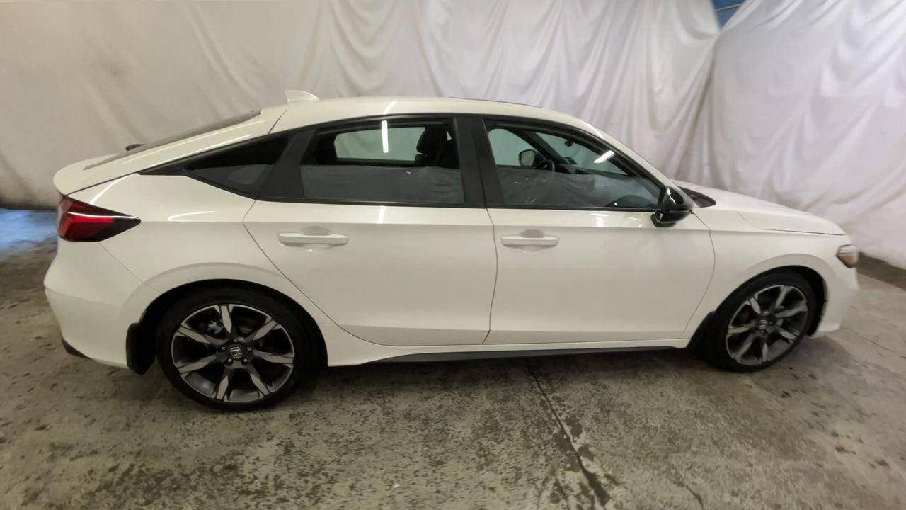 2025 Honda Civic Hatchback Hybrid Sport Touring - Platinum White Pearl exterior view 9