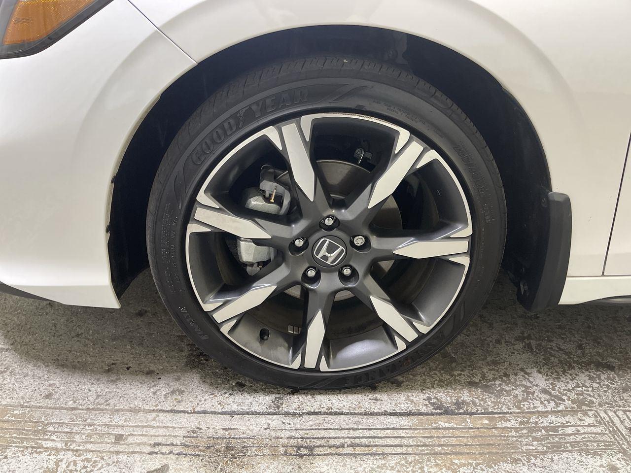 2025 Honda Civic Hatchback Hybrid Sport Touring - Platinum White Pearl exterior view 10
