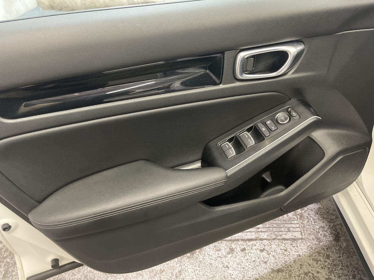 2025 Honda Civic Hatchback Hybrid Sport Touring - Platinum White Pearl exterior view 13