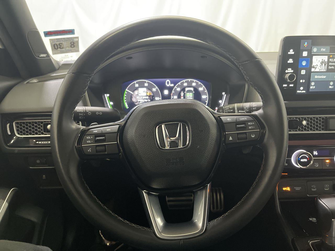 2025 Honda Civic Hatchback Hybrid Sport Touring - Platinum White Pearl exterior view 14