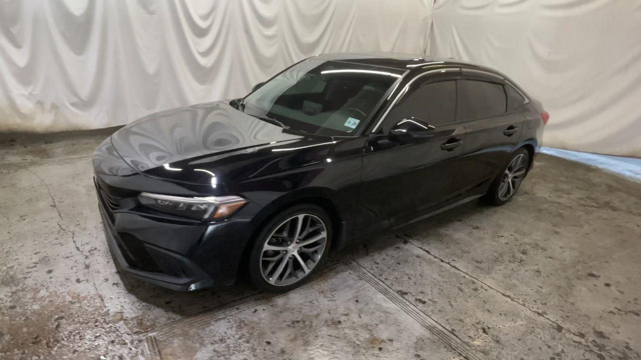2023 Honda Civic Sedan Touring - Crystal Black Pearl exterior view 4