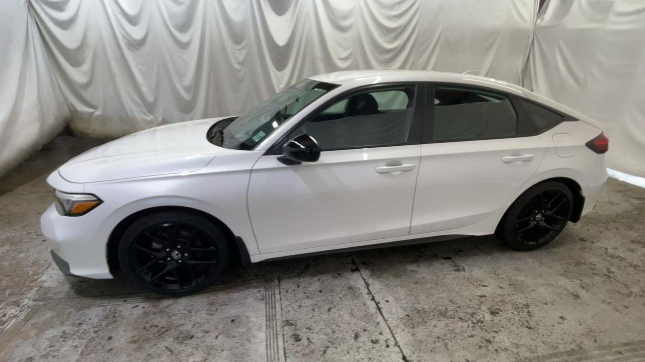 2025 Honda Civic Hatchback Sport - Platinum White Pearl exterior view 4