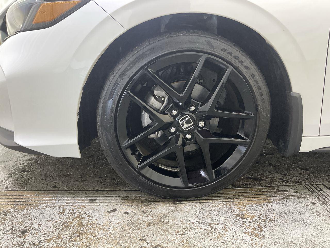 2025 Honda Civic Hatchback Sport - Platinum White Pearl exterior view 10