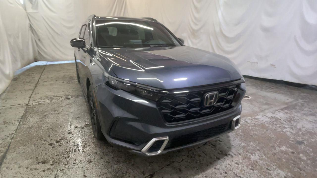 2023 Honda CR-V Hybrid Sport Touring - Meteorite Gray Metallic exterior view 2
