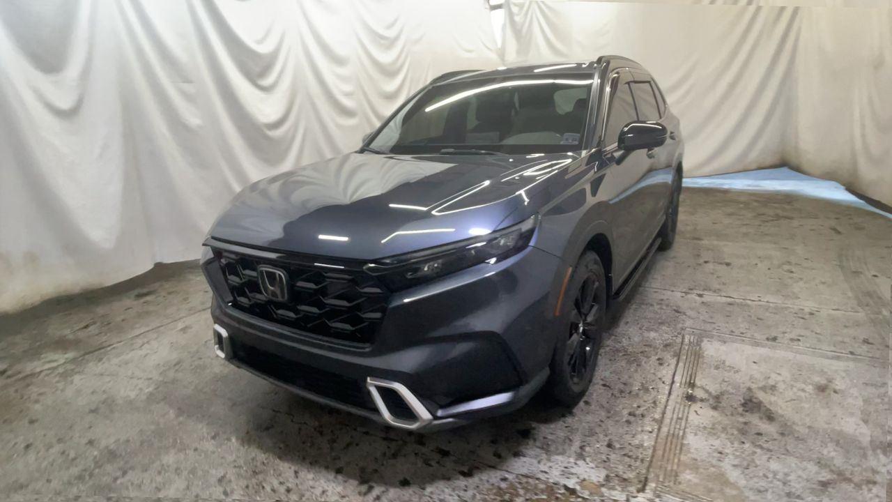 2023 Honda CR-V Hybrid Sport Touring - Meteorite Gray Metallic exterior view 3