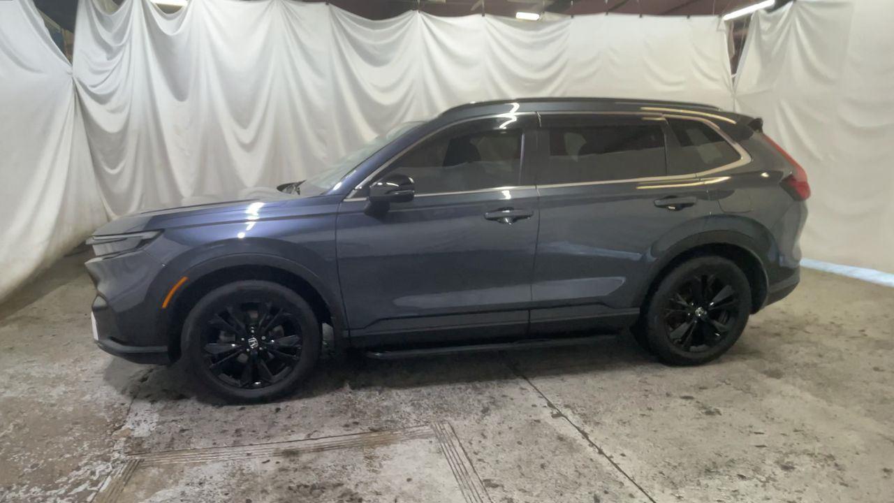 2023 Honda CR-V Hybrid Sport Touring - Meteorite Gray Metallic exterior view 4