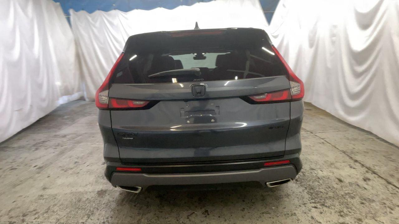 2023 Honda CR-V Hybrid Sport Touring - Meteorite Gray Metallic exterior view 7