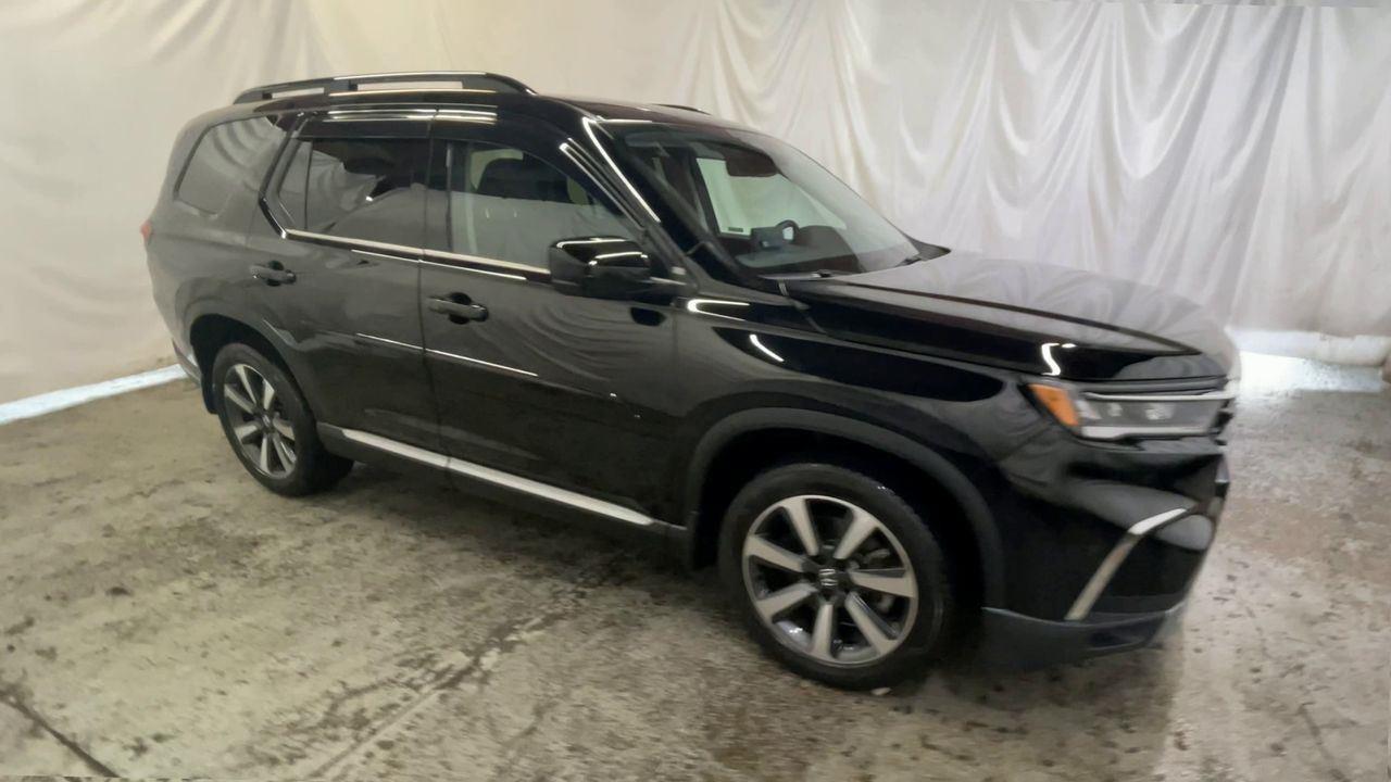 2024 Honda Pilot Touring - Crystal Black Pearl exterior view 2