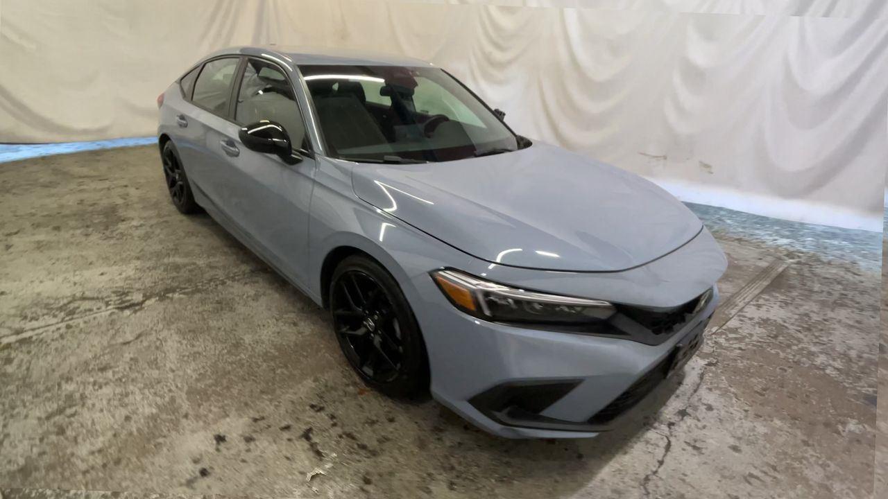 2024 Honda Civic Hatchback Sport - Sonic Gray Pearl exterior view 2