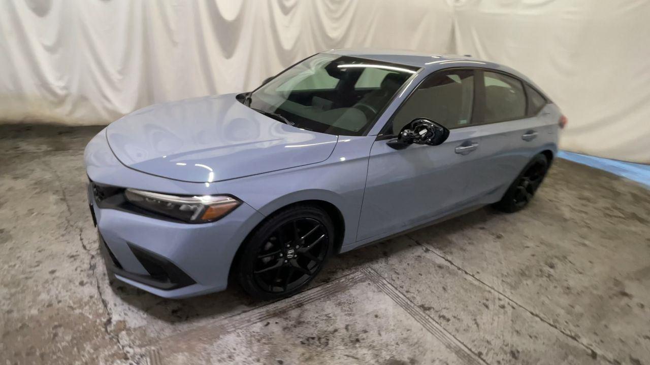 2024 Honda Civic Hatchback Sport - Sonic Gray Pearl exterior view 4