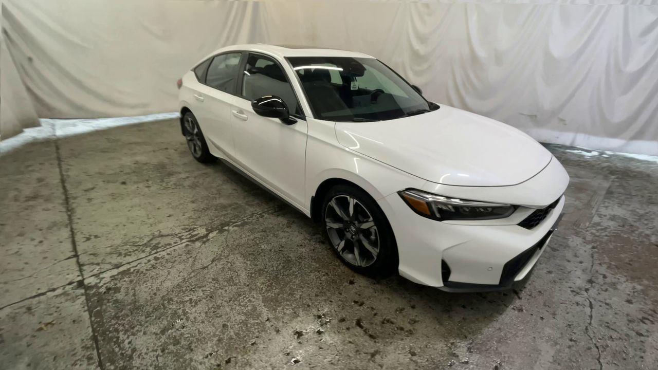 2025 Honda Civic Hatchback Hybrid Sport Touring - Platinum White Pearl exterior view 2