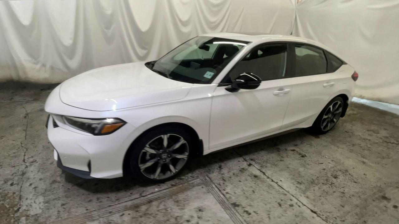 2025 Honda Civic Hatchback Hybrid Sport Touring - Platinum White Pearl exterior view 4