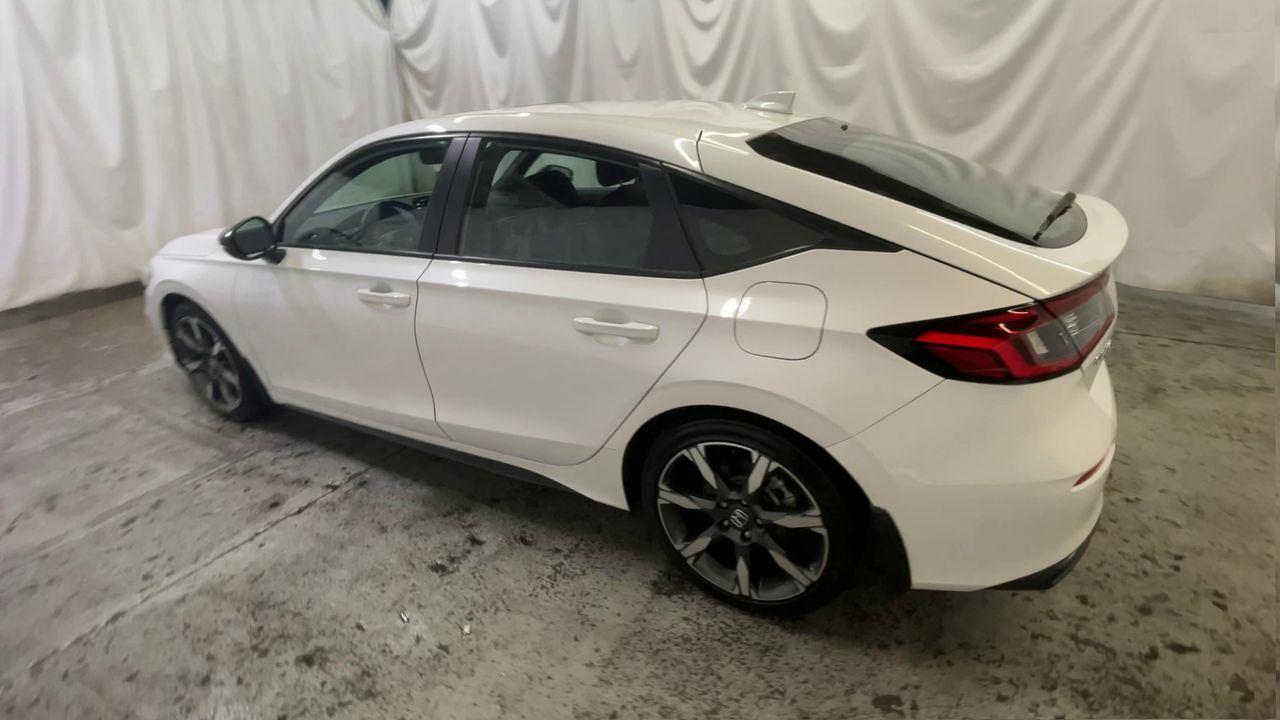 2025 Honda Civic Hatchback Hybrid Sport Touring - Platinum White Pearl exterior view 6