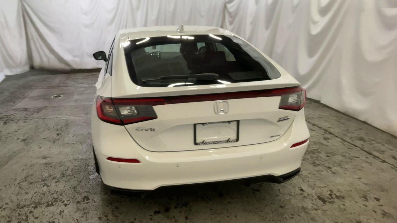 2025 Honda Civic Hatchback Hybrid Sport Touring - Platinum White Pearl exterior view 7