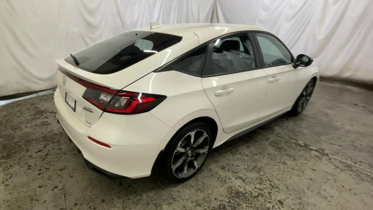 2025 Honda Civic Hatchback Hybrid Sport Touring - Platinum White Pearl exterior view 8