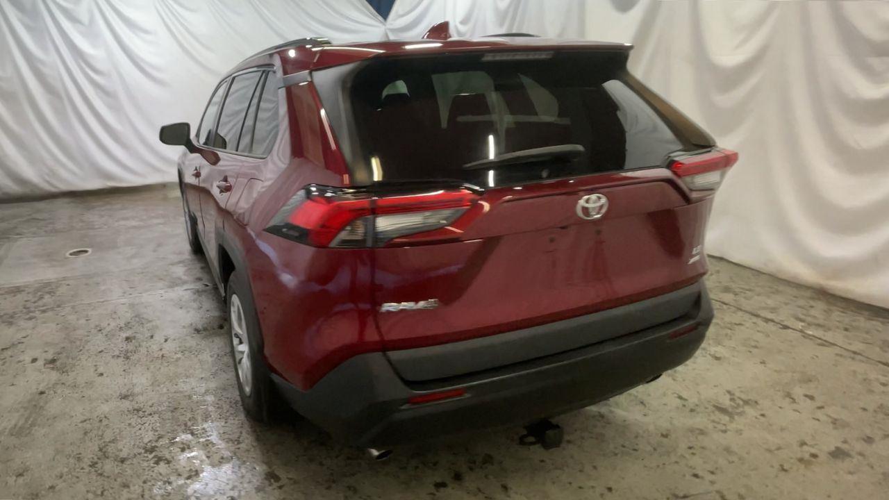 2021 Toyota RAV4 LE - Ruby Flare Pearl exterior view 7