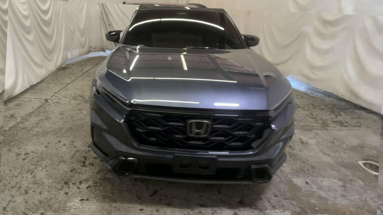 2026 Honda CR-V Hybrid Sport Touring - Meteorite Gray Metallic exterior view 3