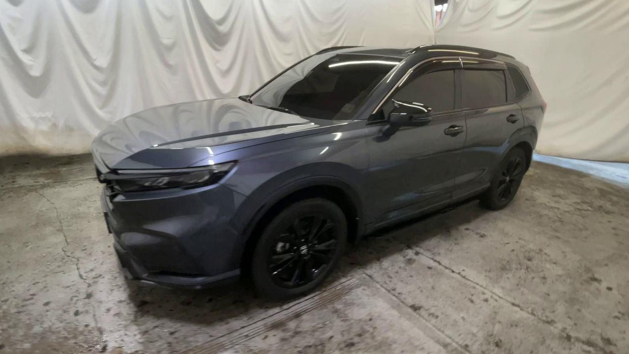 2026 Honda CR-V Hybrid Sport Touring - Meteorite Gray Metallic exterior view 4