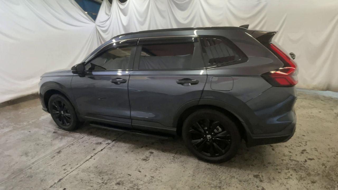 2026 Honda CR-V Hybrid Sport Touring - Meteorite Gray Metallic exterior view 6