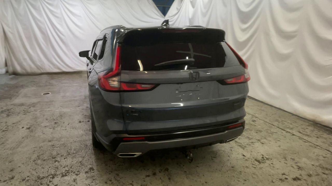 2026 Honda CR-V Hybrid Sport Touring - Meteorite Gray Metallic exterior view 7