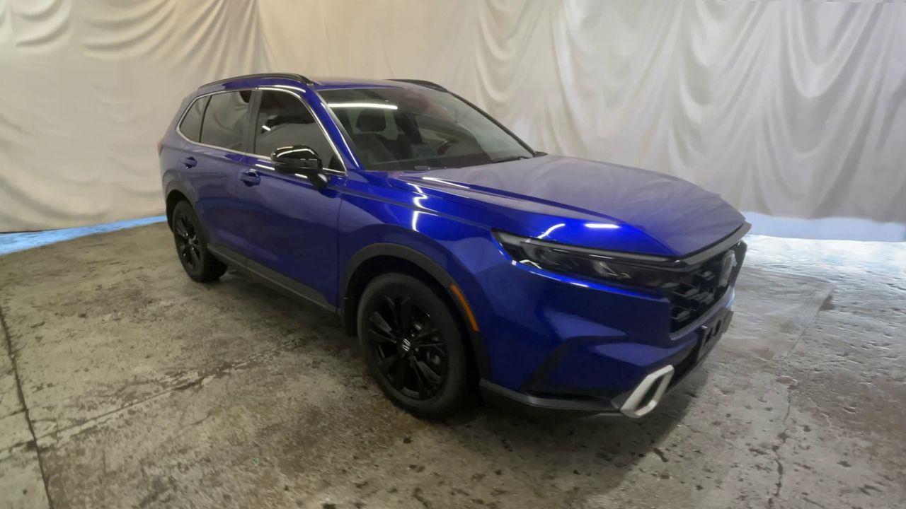 2024 Honda CR-V Hybrid Sport Touring - Still Night Pearl exterior view 2