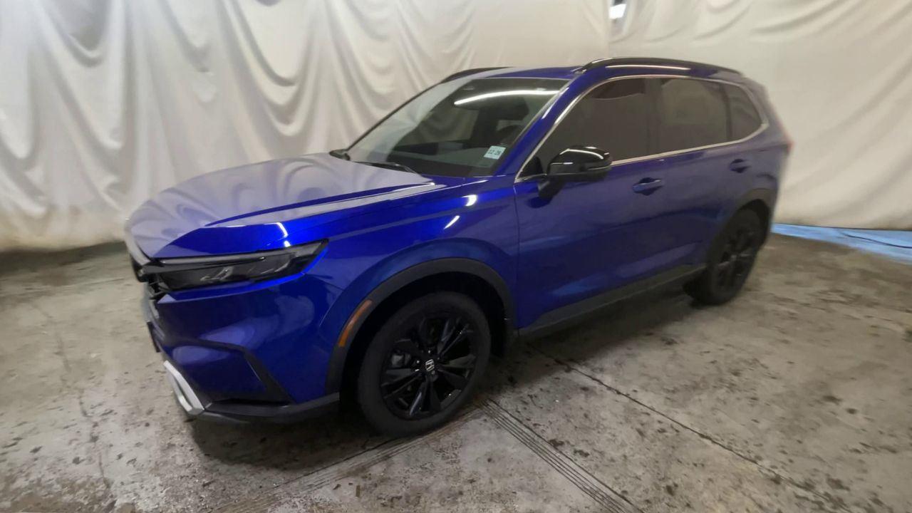 2024 Honda CR-V Hybrid Sport Touring - Still Night Pearl exterior view 4