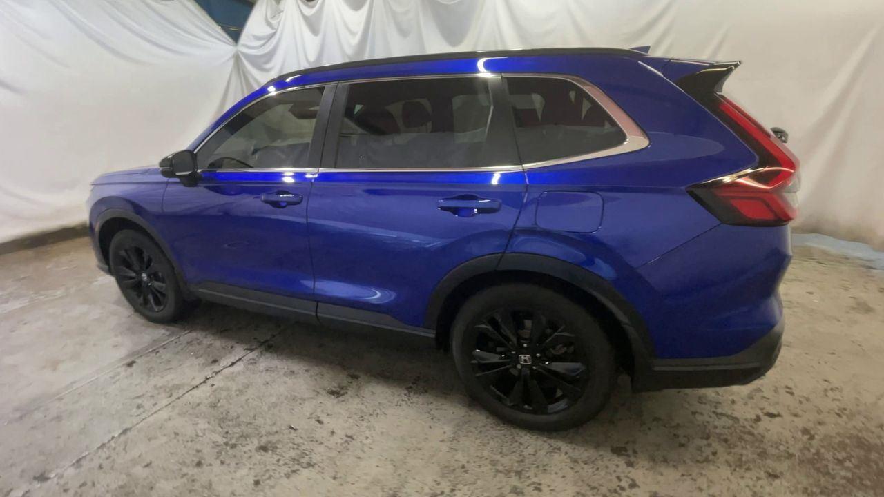2024 Honda CR-V Hybrid Sport Touring - Still Night Pearl exterior view 6