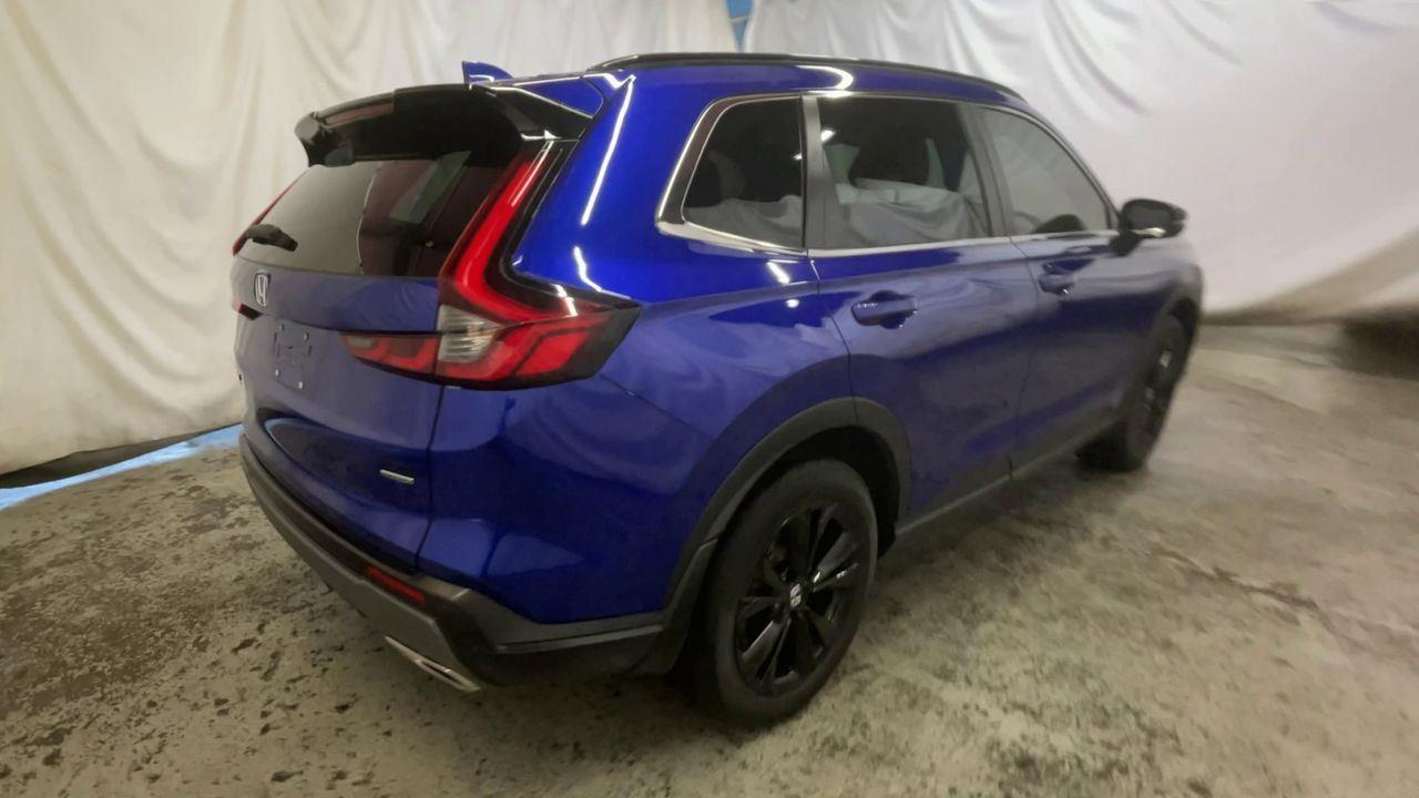 2024 Honda CR-V Hybrid Sport Touring - Still Night Pearl exterior view 8