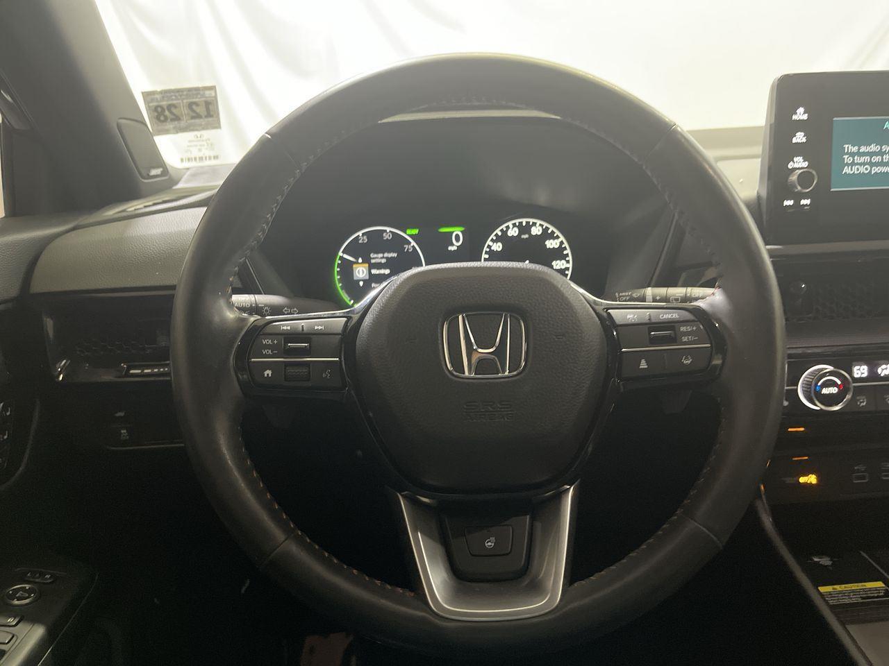 2024 Honda CR-V Hybrid Sport Touring - Still Night Pearl exterior view 14