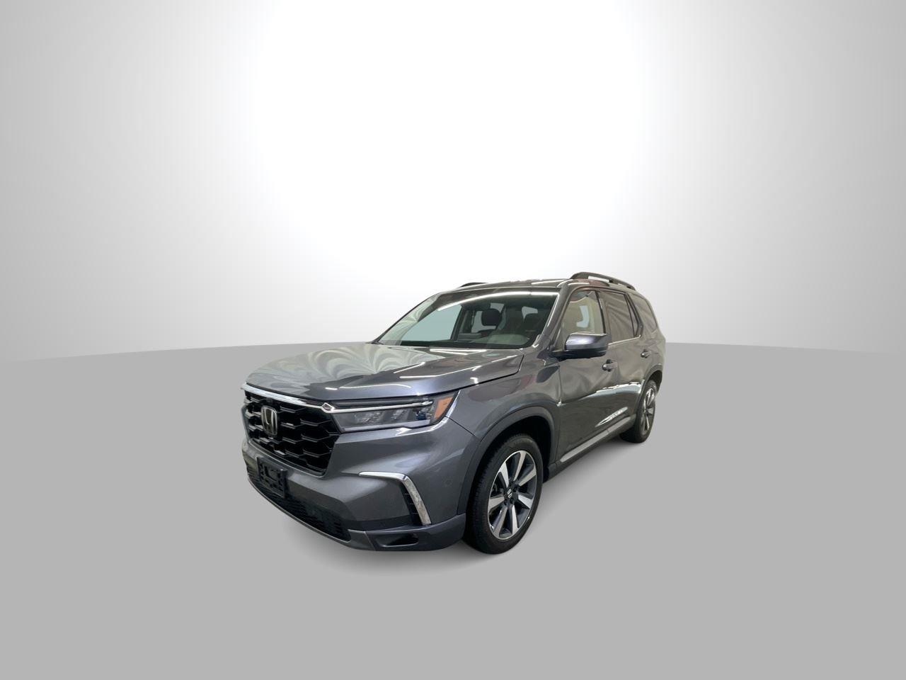 2023 Honda Pilot Elite - Sonic Gray Pearl exterior view 1