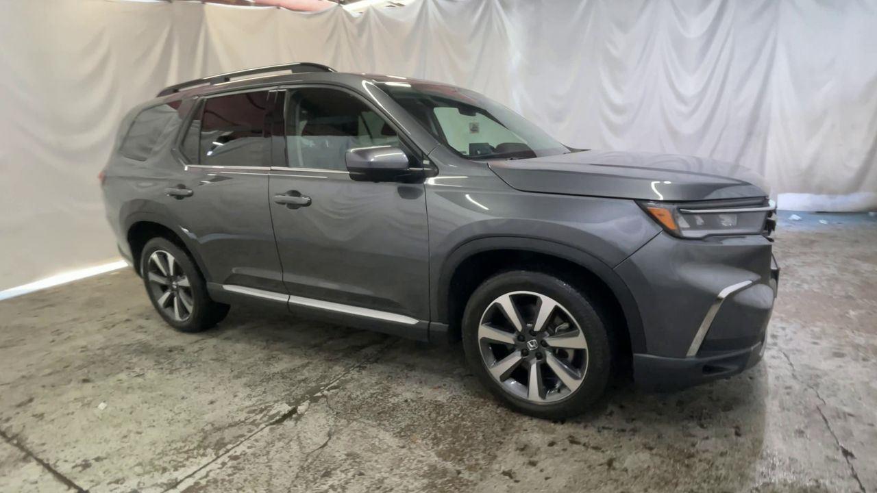 2023 Honda Pilot Elite - Sonic Gray Pearl exterior view 2