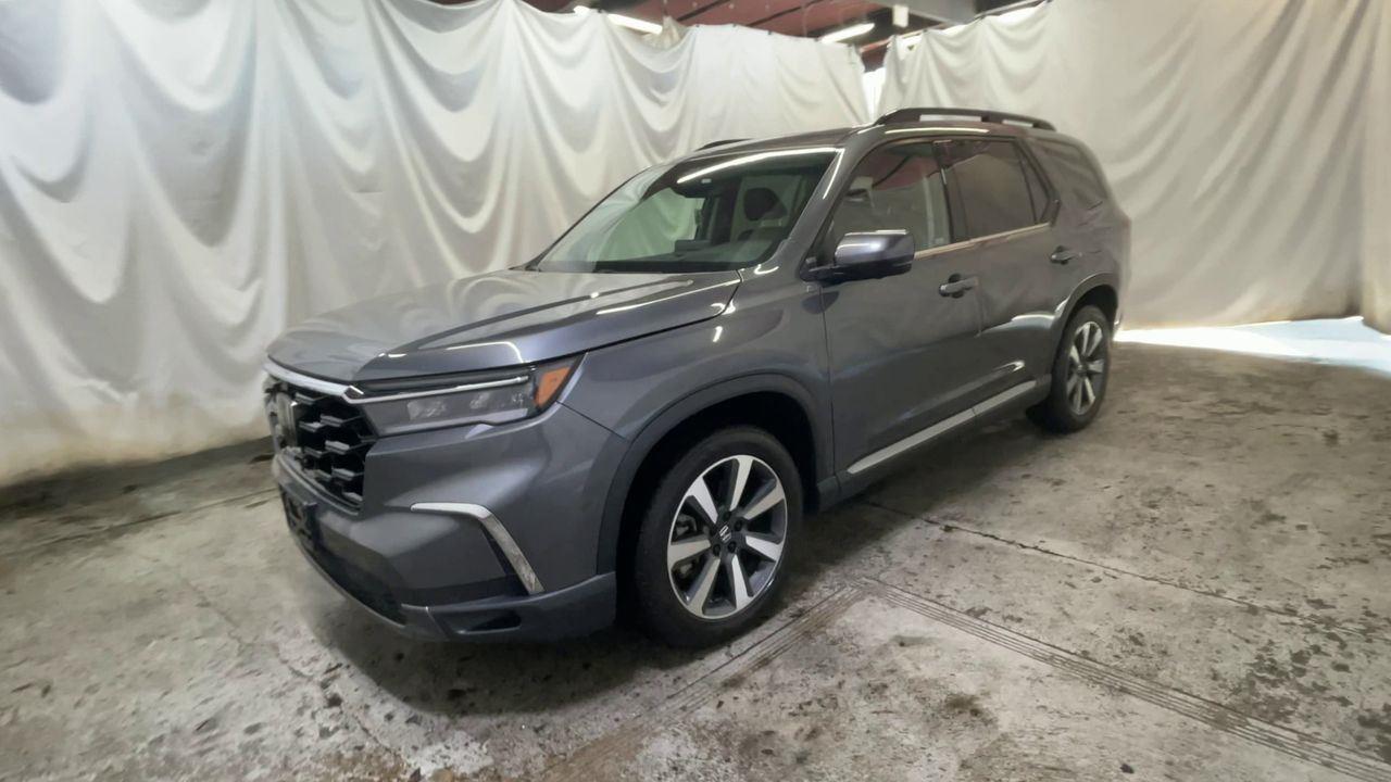 2023 Honda Pilot Elite - Sonic Gray Pearl exterior view 4