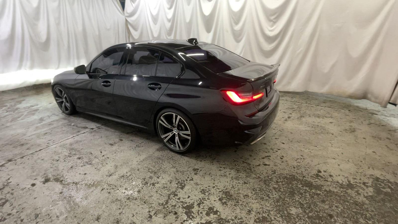 2020 BMW 3 Series M340i xDrive - Black Sapphire Metallic exterior view 8