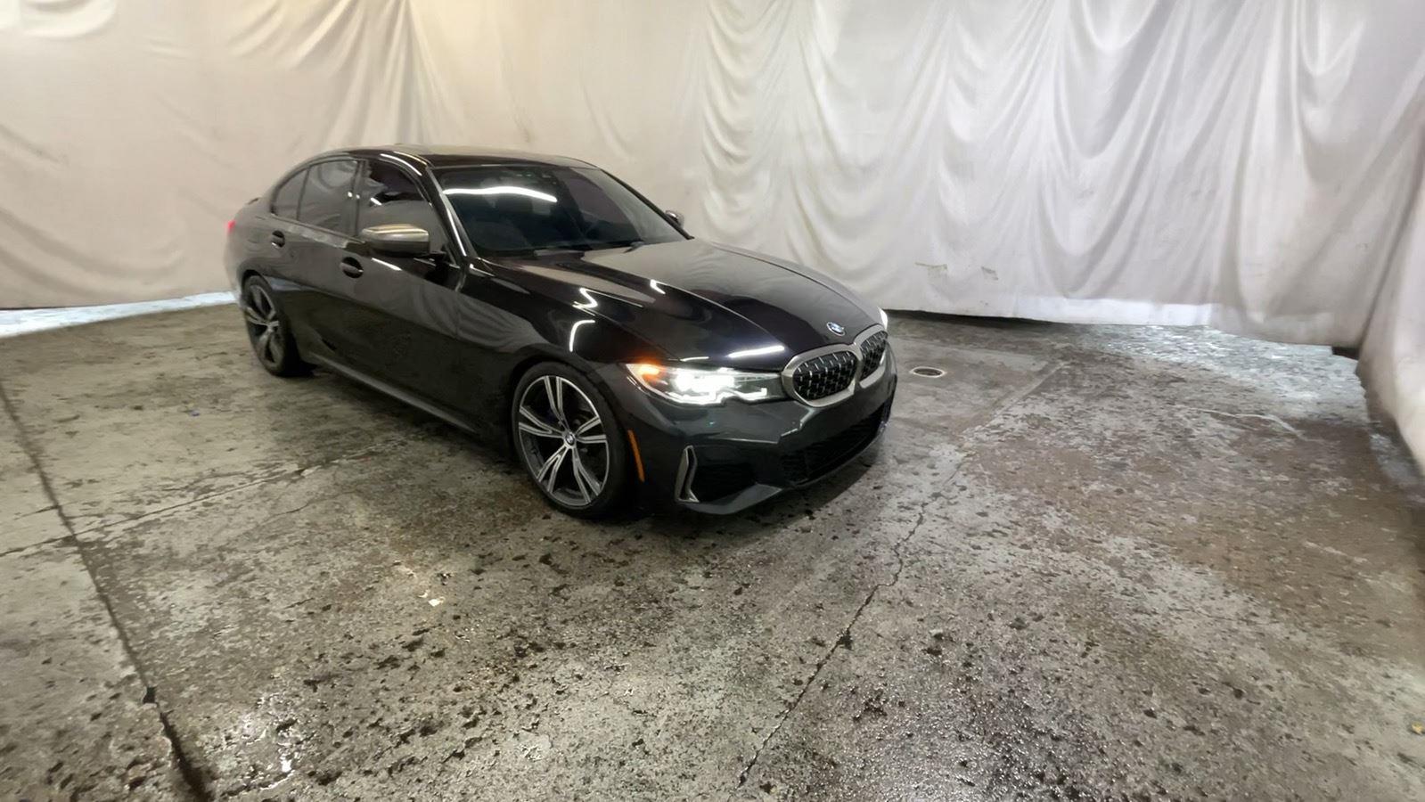 2020 BMW 3 Series M340i xDrive - Black Sapphire Metallic exterior view 2
