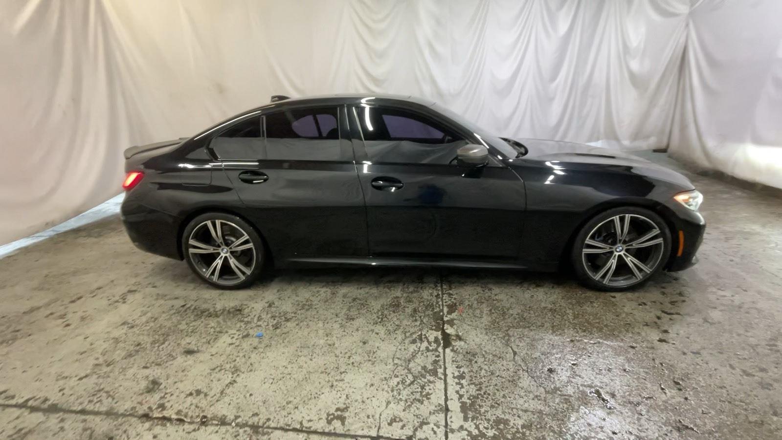 2020 BMW 3 Series M340i xDrive - Black Sapphire Metallic exterior view 4
